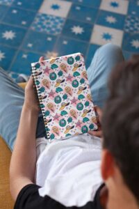 mockup-of-a-notebook-held-by-a-brunette-boy-24144