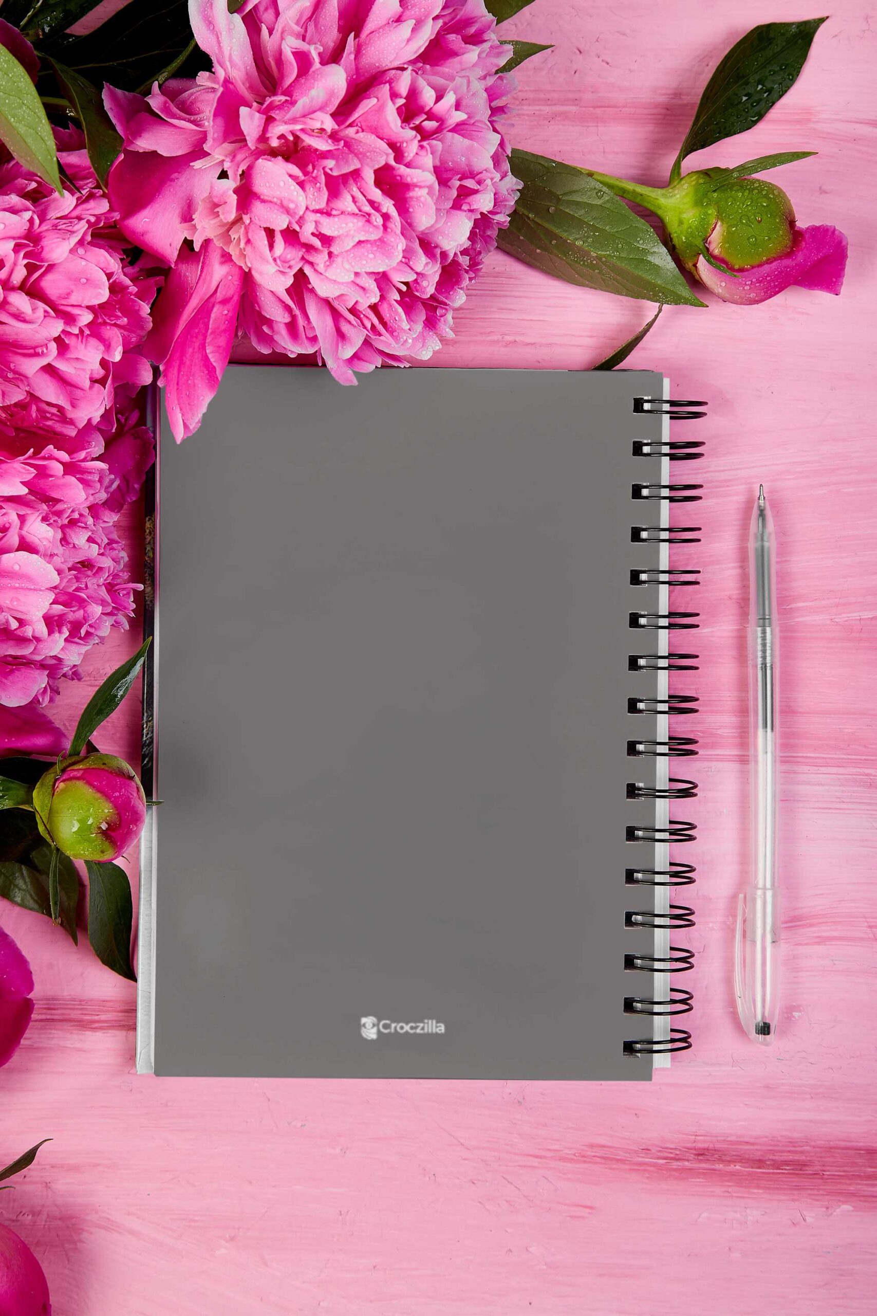 notebook-mockup-featuring-flowers-and-a-pen-m32051-r-el2