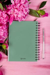 notebook-mockup-featuring-flowers-and-a-pen-m32051-r-el2