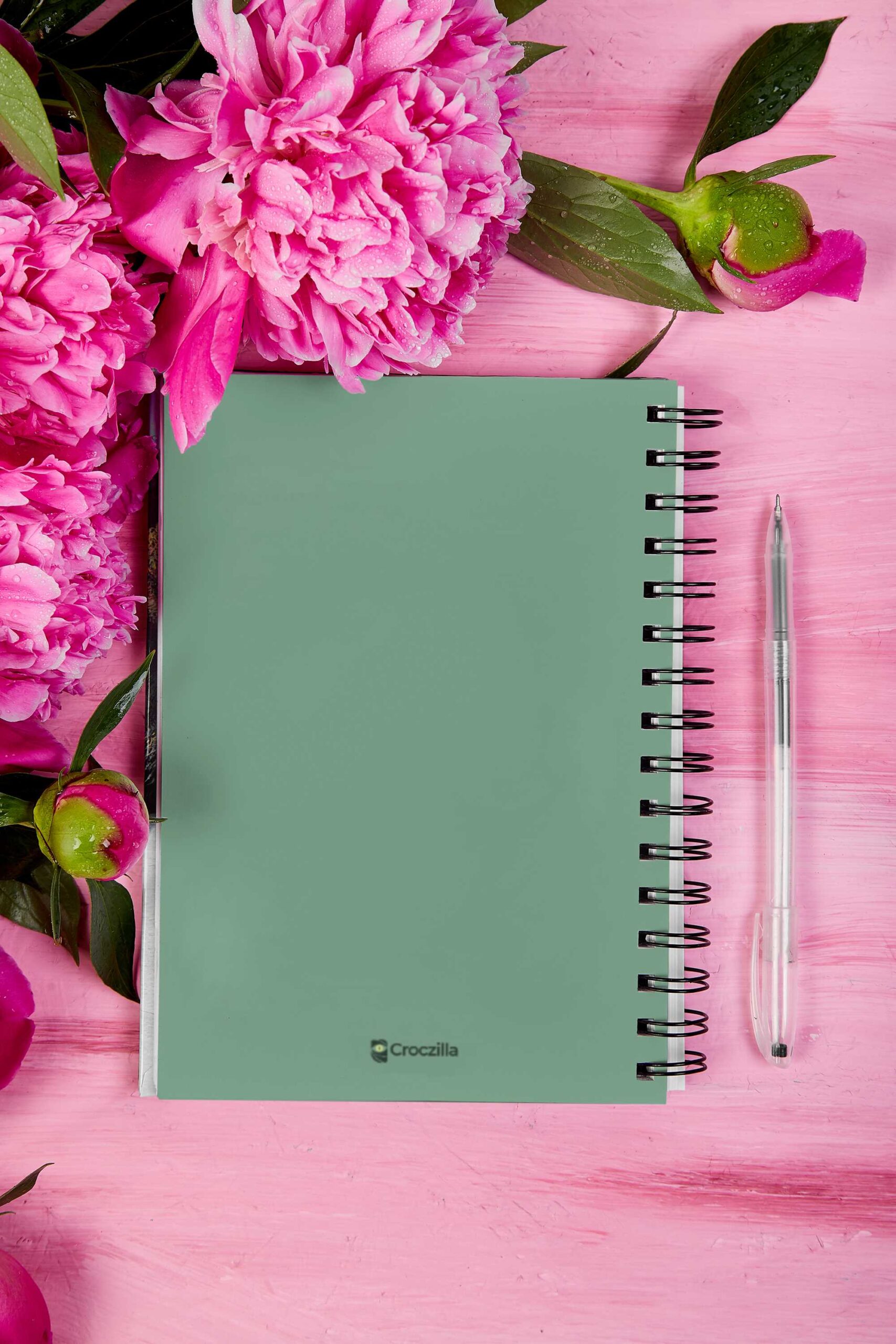 notebook-mockup-featuring-flowers-and-a-pen-m32051-r-el2