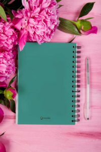 notebook-mockup-featuring-flowers-and-a-pen-m32051-r-el2