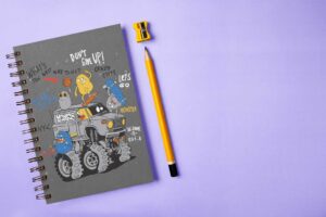 spiral-notebook-mockup-featuring-a-pencil-and-a-sharpener-m28873-r-el2