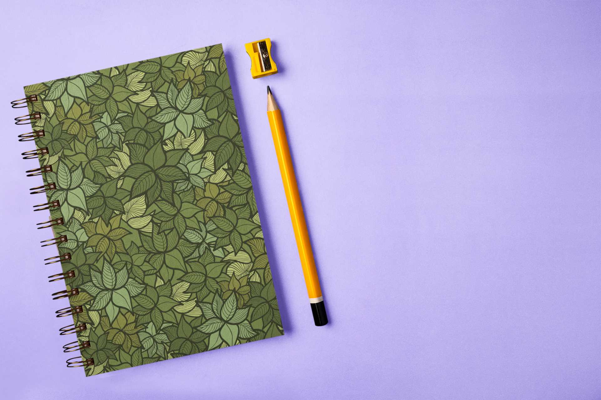 spiral-notebook-mockup-featuring-a-pencil-and-a-sharpener-m28873-r-el2