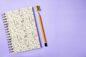 spiral-notebook-mockup-featuring-a-pencil-and-a-sharpener-m28873-r-el2