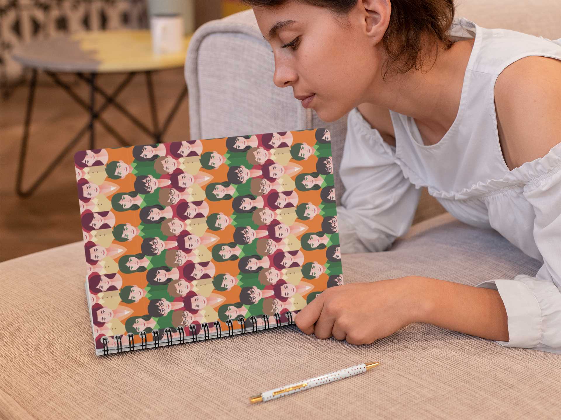 spiral-notebook-mockup-featuring-a-woman-reading-29955
