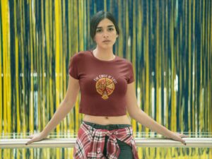 woman-wearing-a-crop-top-tee-mockup-against-a-blue-and-yellow-background-a19531 (1)