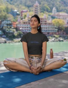 crop-top-mockup-featuring-a-woman-meditating-next-to-a-lake-m33671