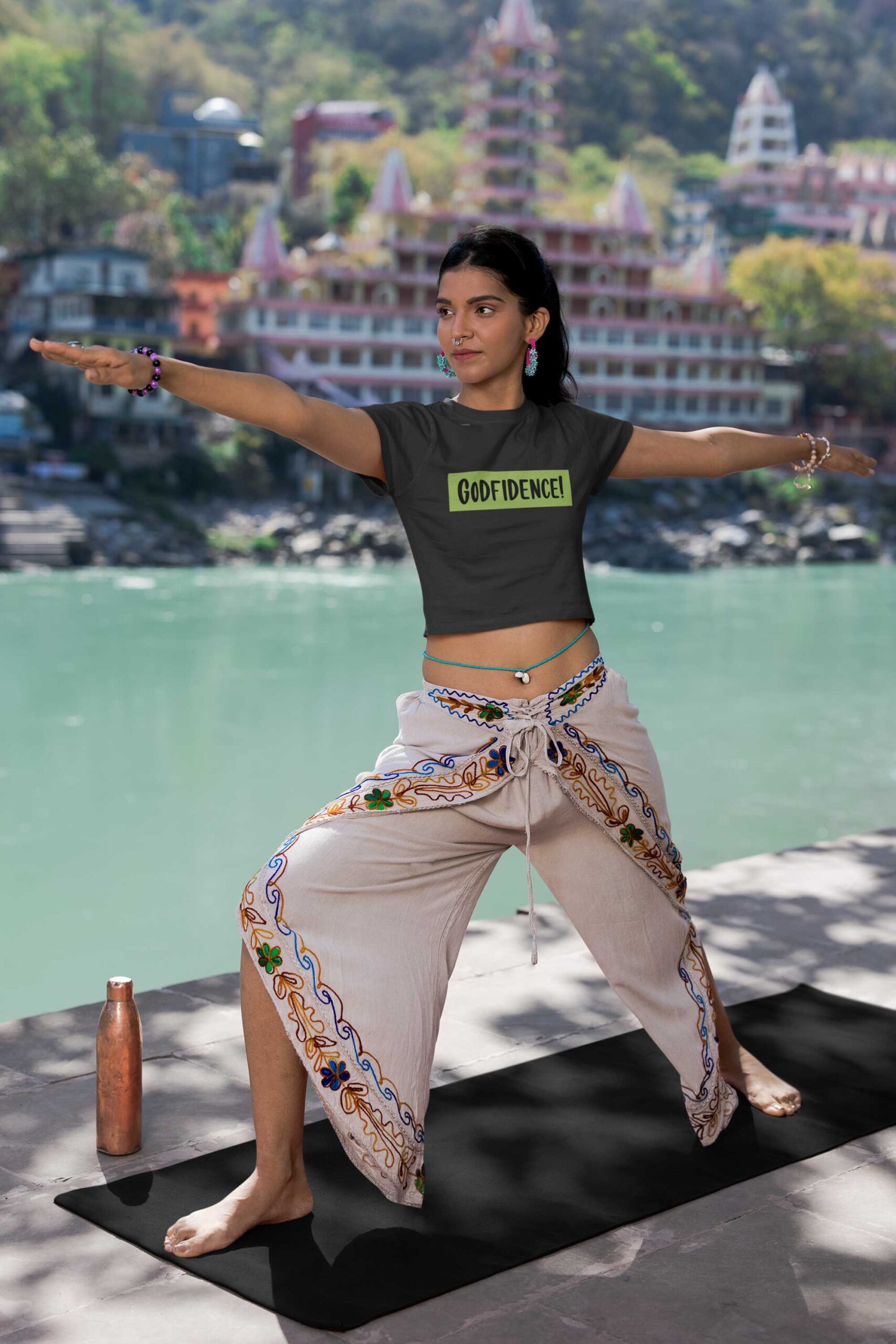 crop-top-mockup-featuring-a-woman-practicing-yoga-by-a-lake-m33670
