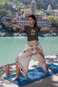 crop-top-mockup-featuring-a-woman-practicing-yoga-by-a-lake-m33670