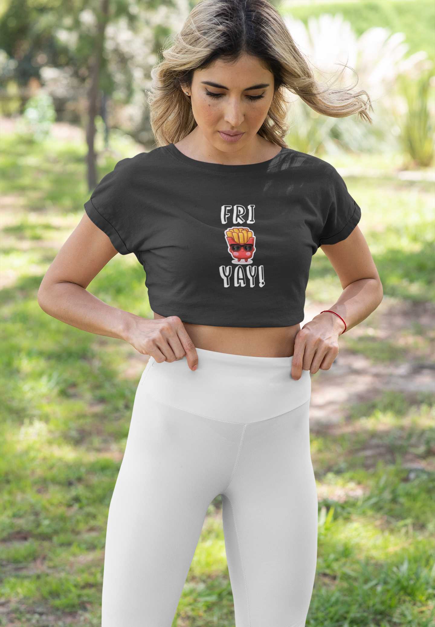 crop-top-tee-and-bike-shorts-mockup-featuring-a-woman-at-a-park-42383a