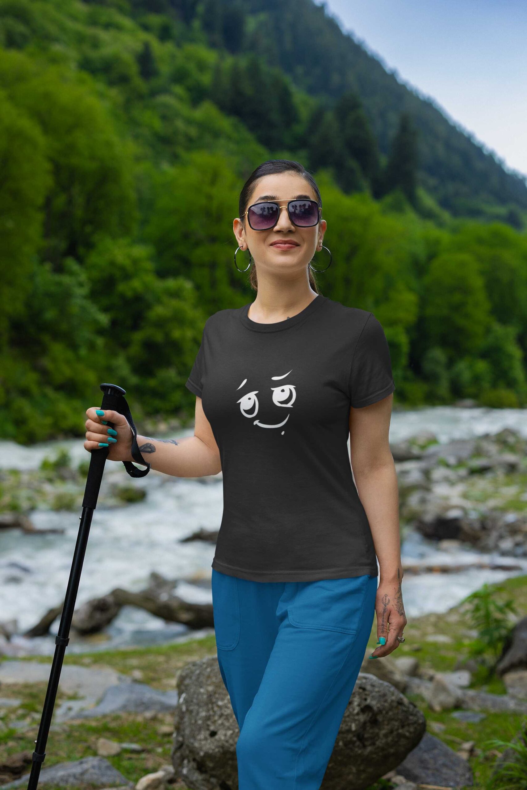 gildan-t-shirt-mockup-featuring-a-woman-hiking-on-a-mountain-m35569