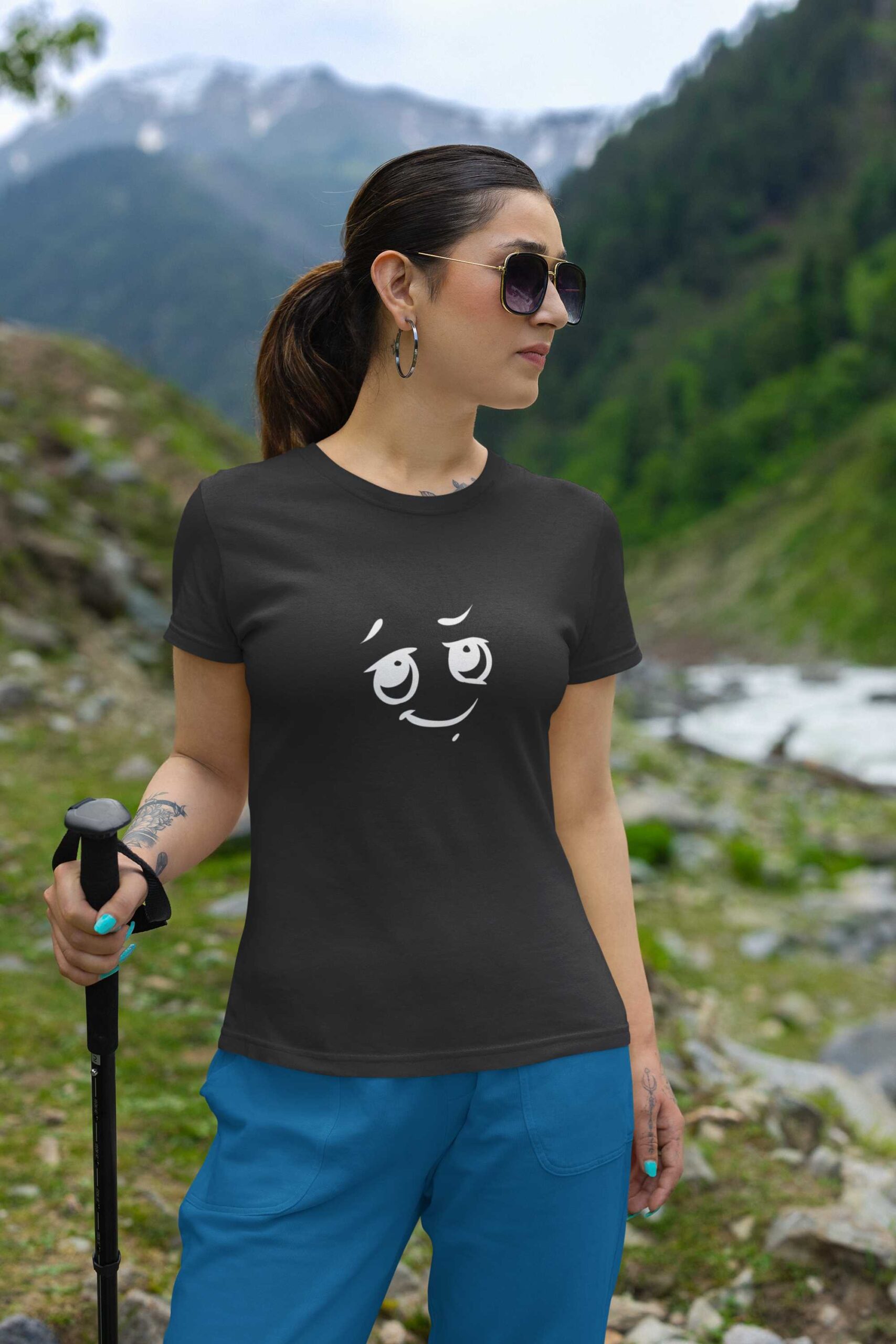 gildan-t-shirt-mockup-featuring-a-woman-on-a-mountain-with-a-hiking-stick-m35570