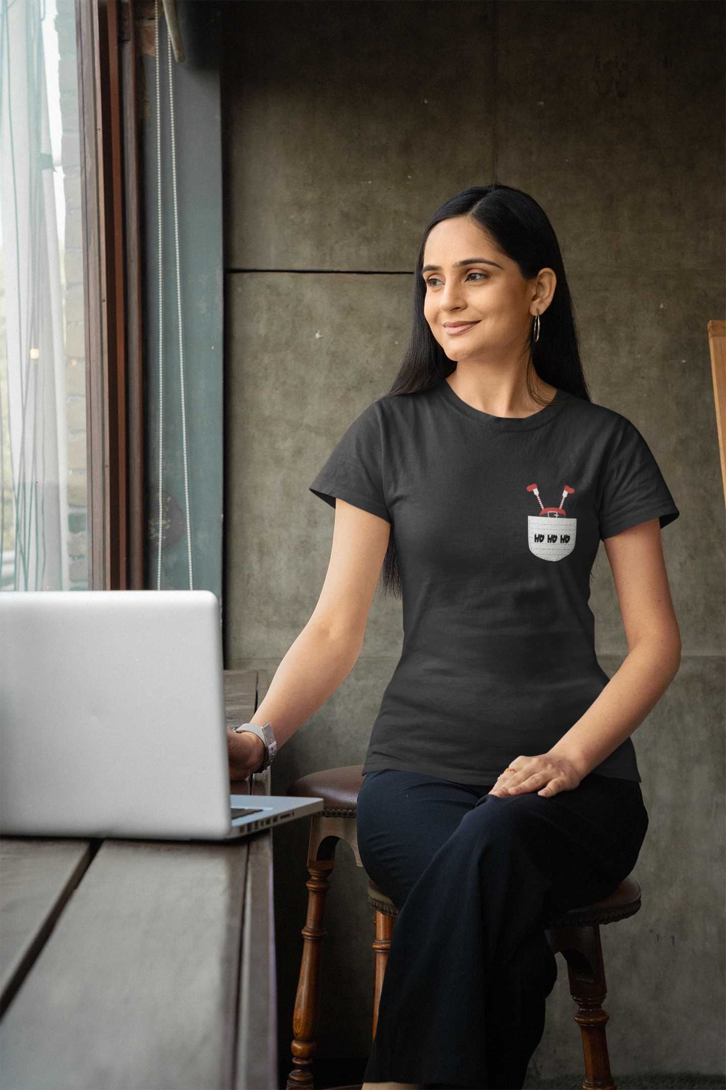 gildan-t-shirt-mockup-of-a-smiling-woman-working-on-her-laptop-m31785