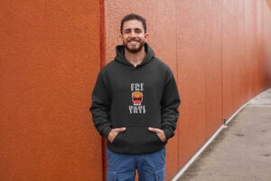 hoodie-mockup-of-a-man-posing-against-a-red-wall-28630