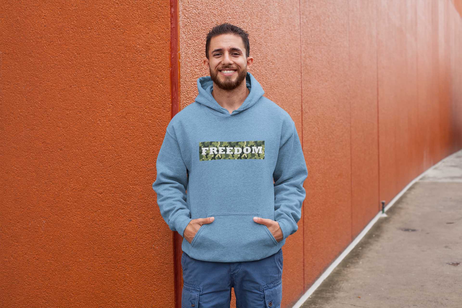 hoodie-mockup-of-a-man-posing-against-a-red-wall-28630