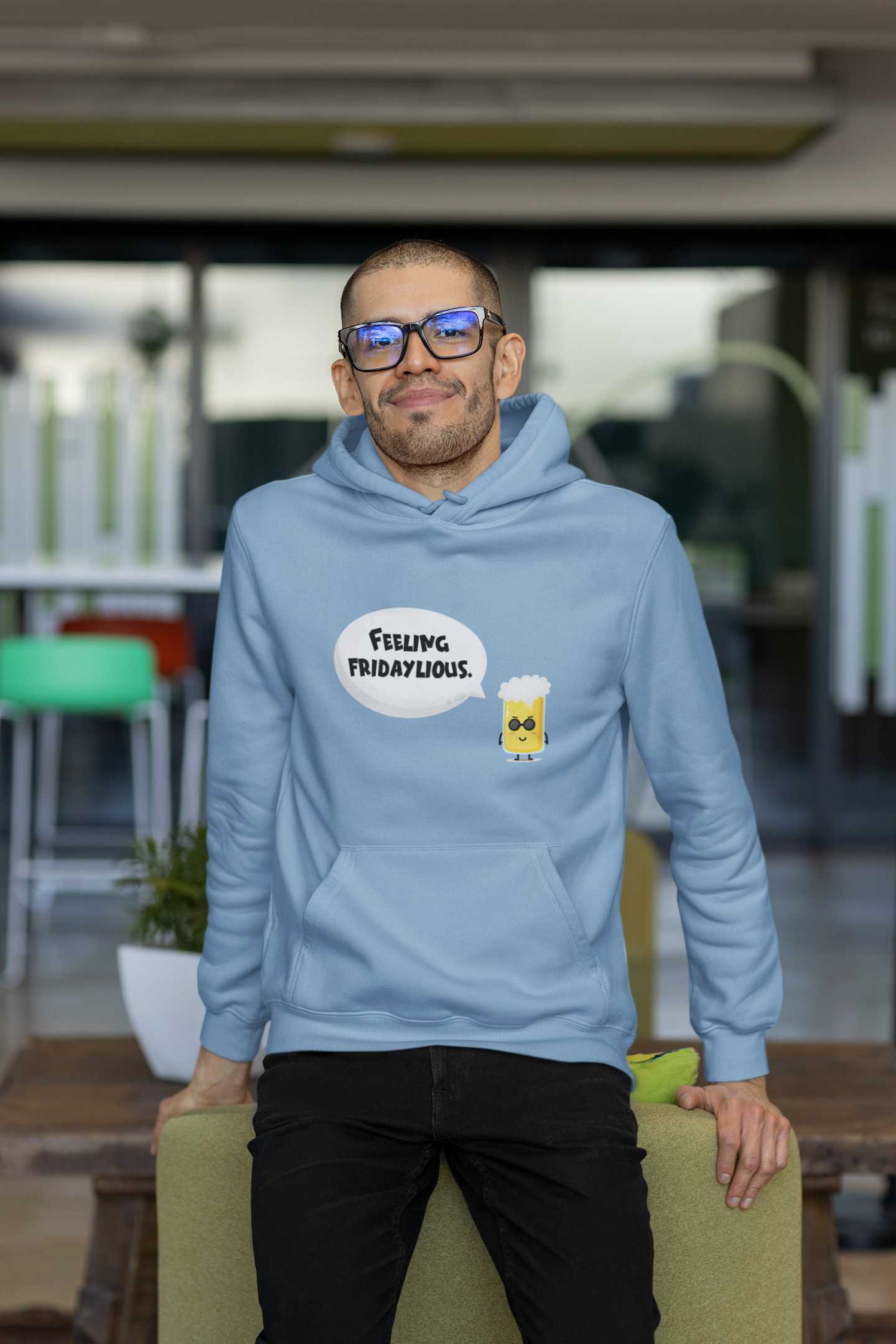 hoodie-mockup-of-a-man-with-glasses-leaning-on-a-couch-m24806