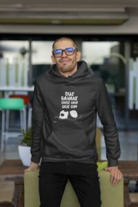 hoodie-mockup-of-a-man-with-glasses-leaning-on-a-couch-m24806