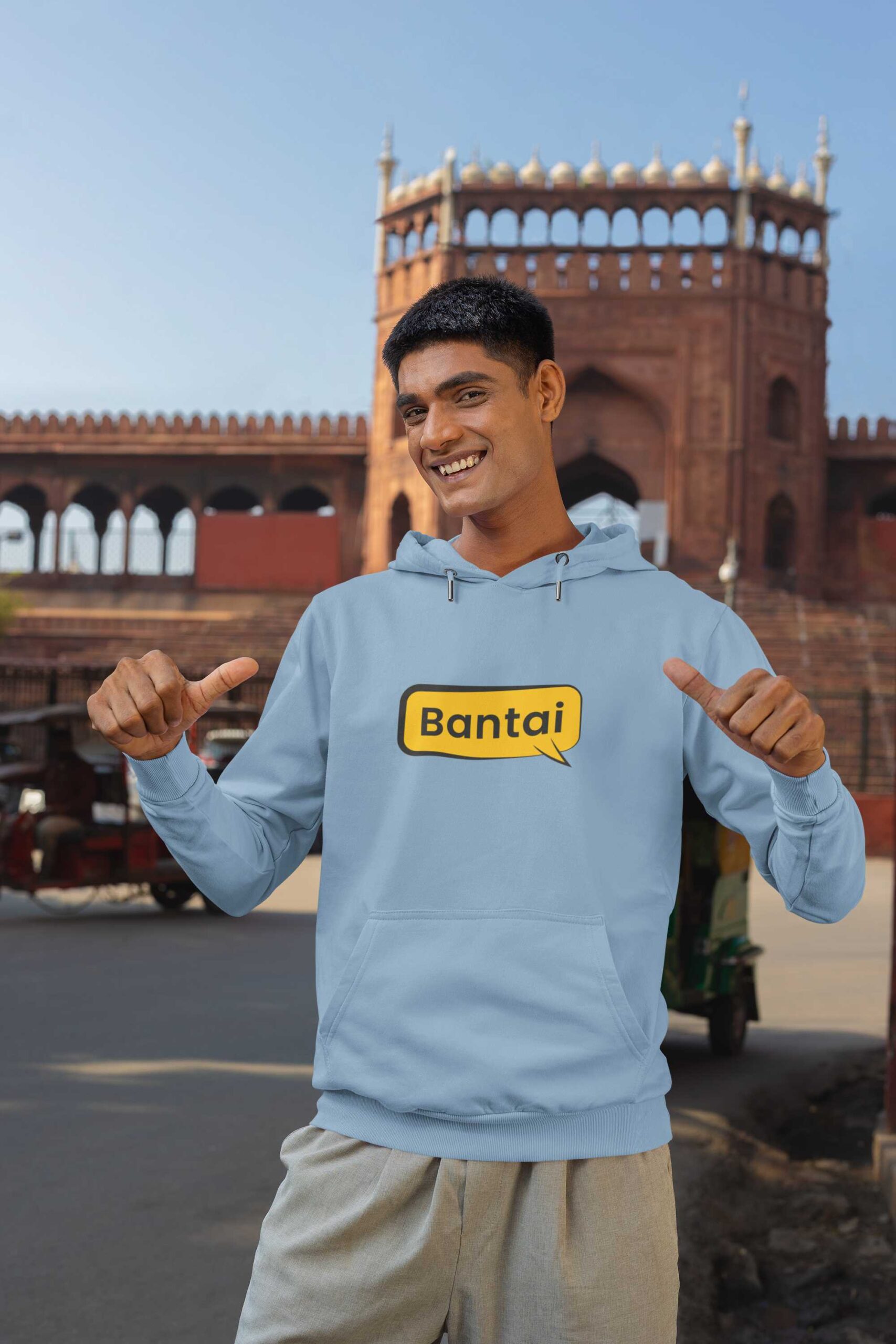 mockup-of-a-cheerful-man-pointing-at-his-gildan-pullover-hoodie-m35339