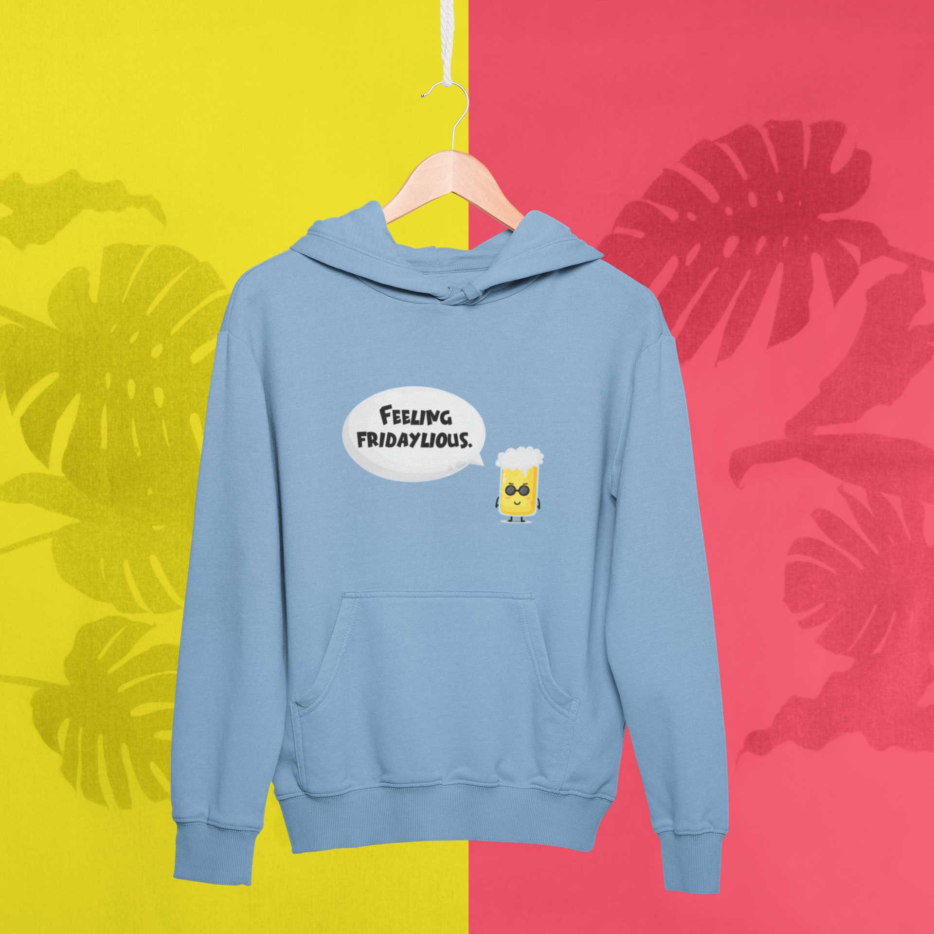 mockup-of-a-hanger-with-a-pullover-hoodie-against-a-tropical-surface-27019