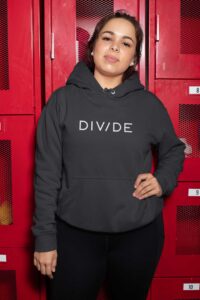 plus-size-hoodie-mockup-of-a-woman-posing-by-some-lockers-30152