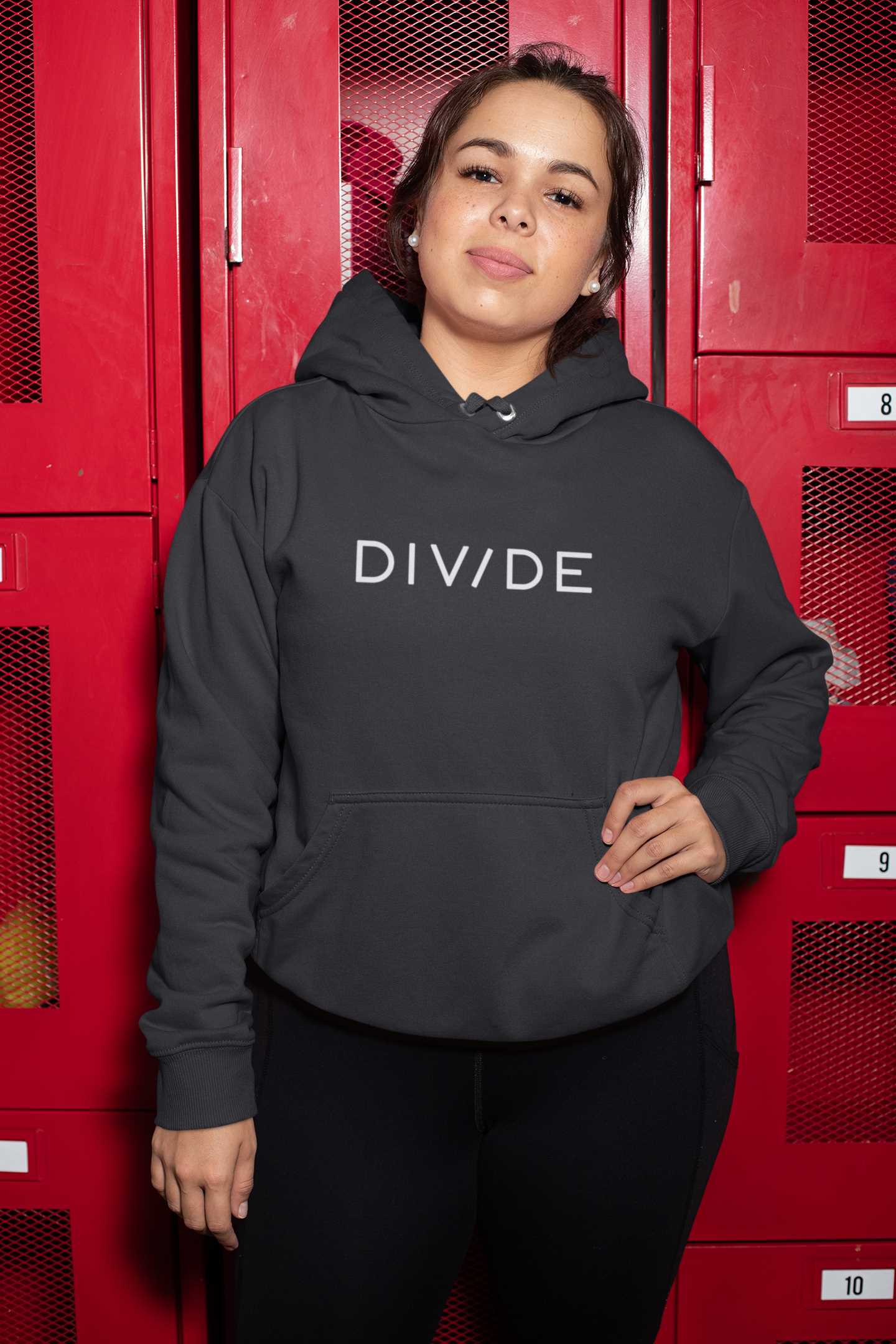 plus-size-hoodie-mockup-of-a-woman-posing-by-some-lockers-30152