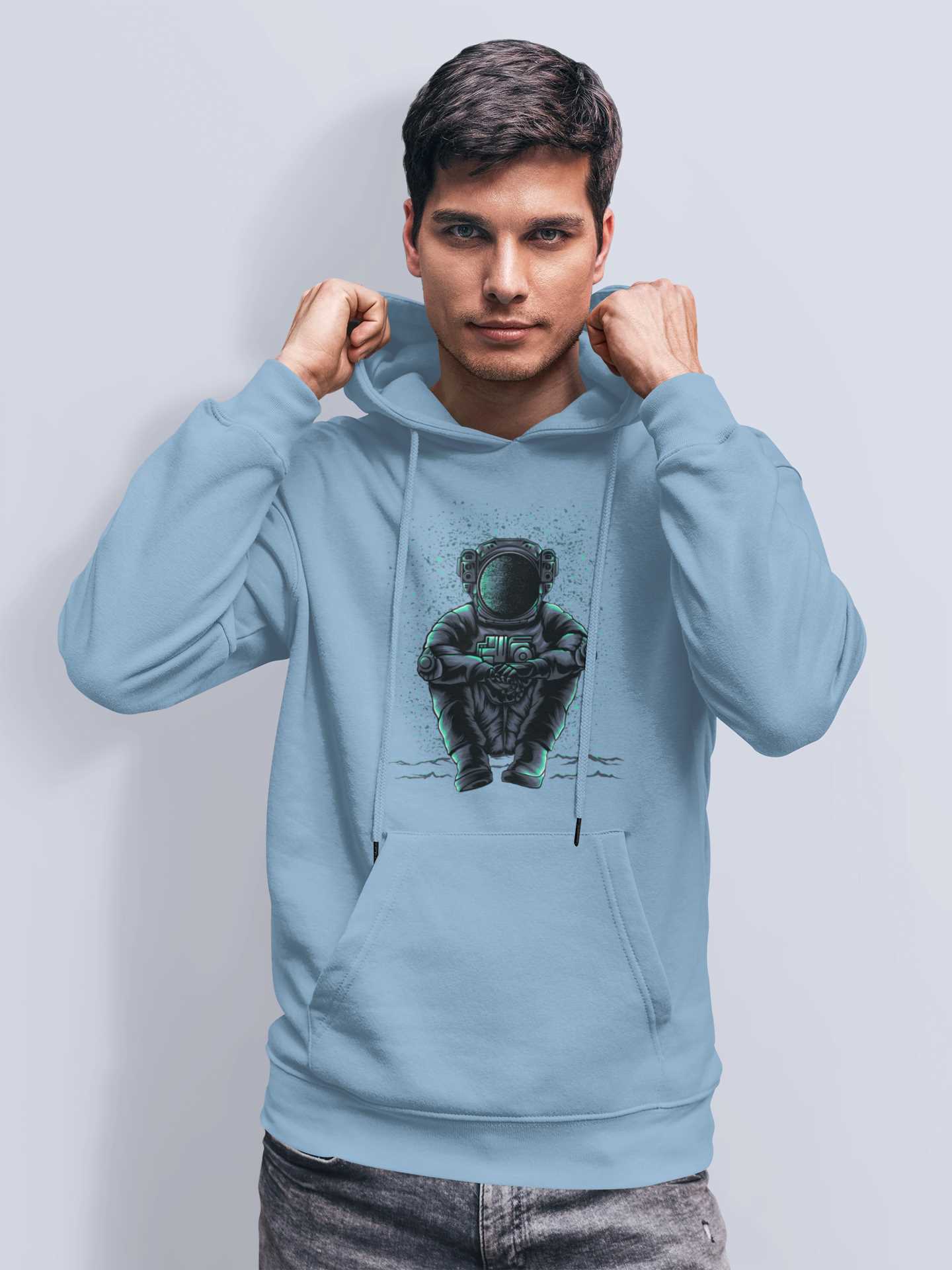 pullover-hoodie-mockup-featuring-a-man-posing-against-a-solid-surface-5124-el1