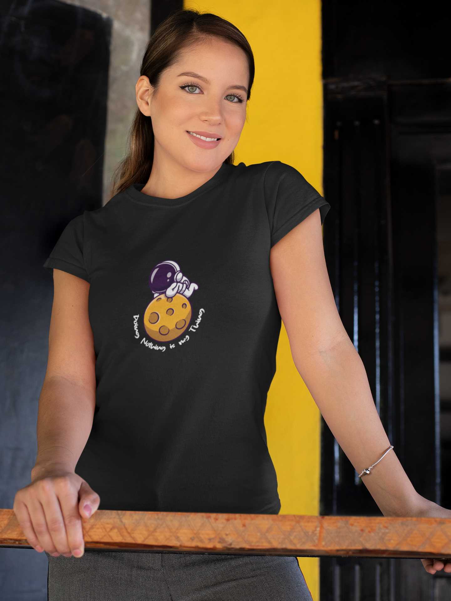 t-shirt-mockup-of-a-woman-leaning-on-a-handrail-28207