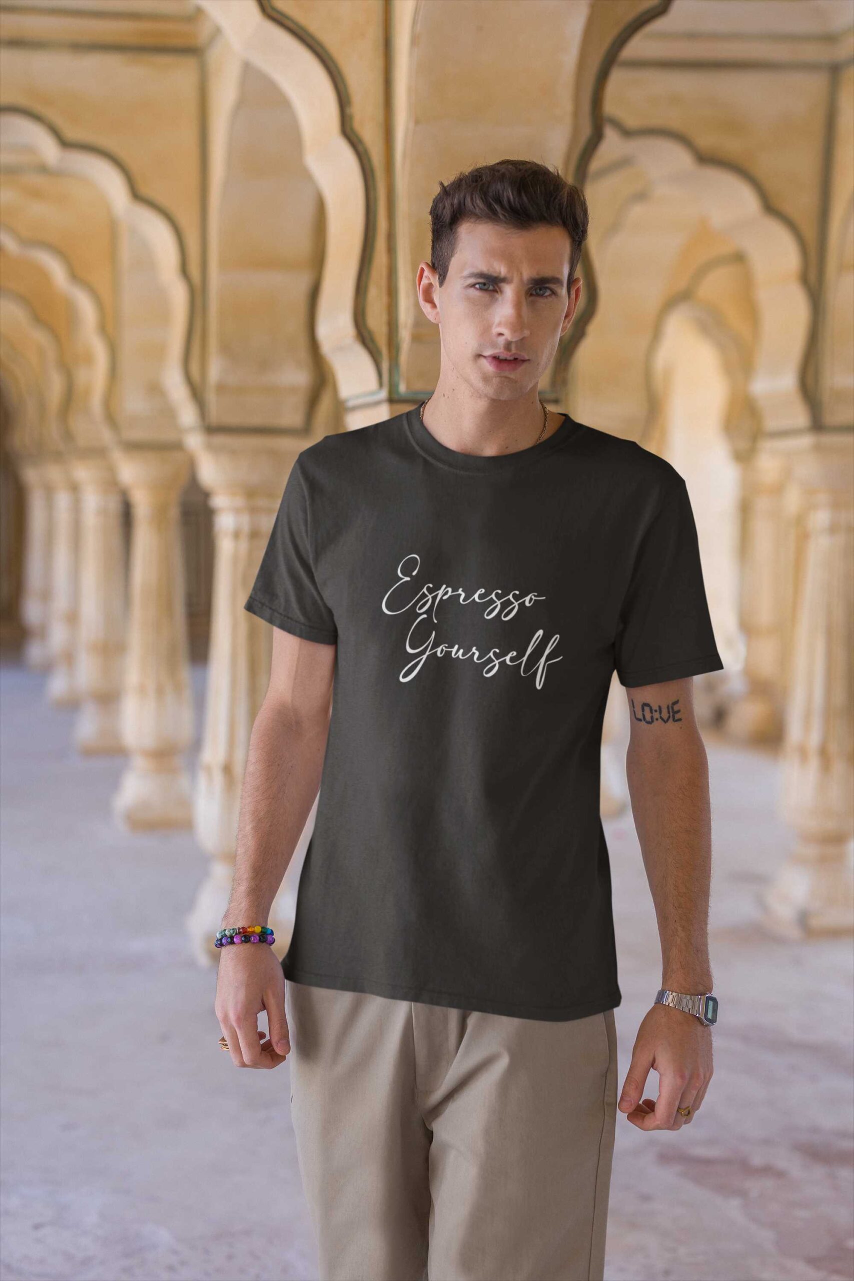 travel-themed-mockup-featuring-a-tattooed-man-wearing-a-gildan-t-shirt-m34641