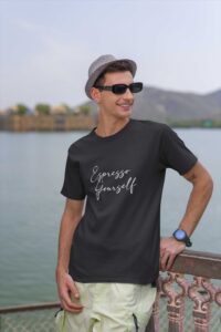 travel-themed-mockup-of-a-cheerful-man-wearing-a-gildan-round-neck-t-shirt-m34644