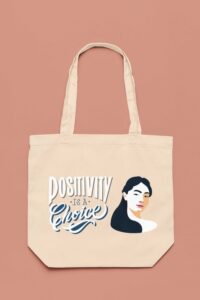 mockup-of-an-econscious-tote-bag-flat-laid-over-a-customizable-surface-m35325