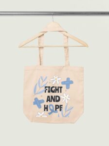 mockup-of-an-econscious-tote-bag-placed-on-a-wooden-hanger-m35323 (1)