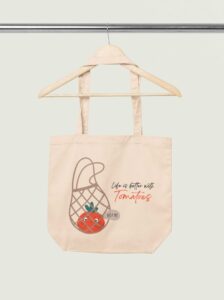 mockup-of-an-econscious-tote-bag-placed-on-a-wooden-hanger-m35323