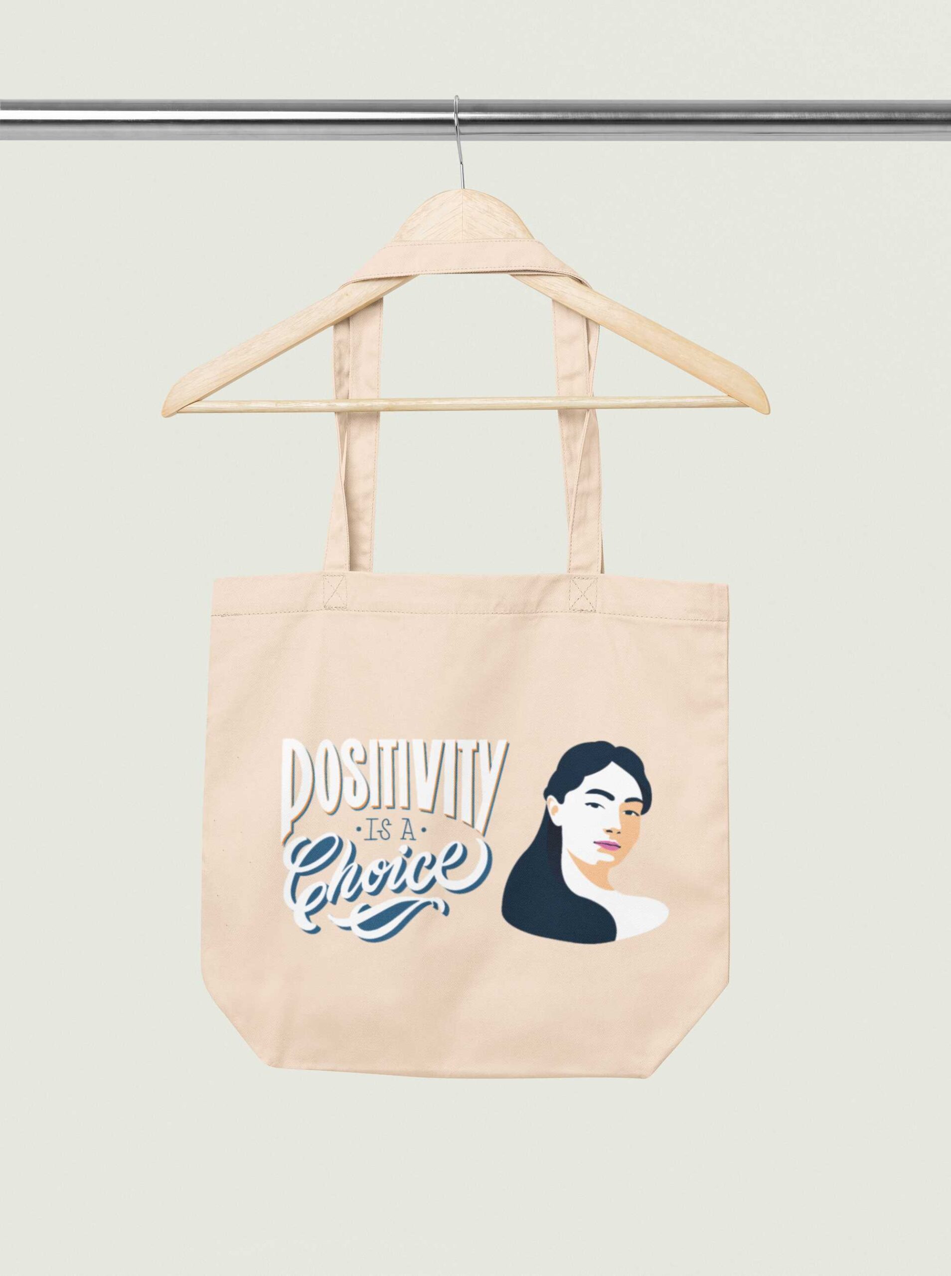 mockup-of-an-econscious-tote-bag-placed-on-a-wooden-hanger-m35323