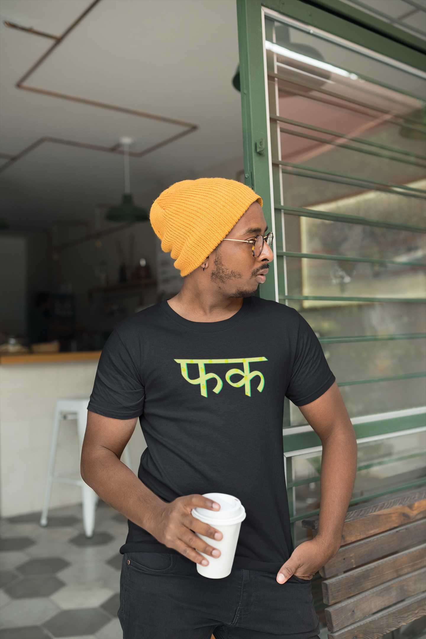 t-shirt-mockup-of-a-man-holding-a-coffee-cup-outside-a-cafe-21047 (22)