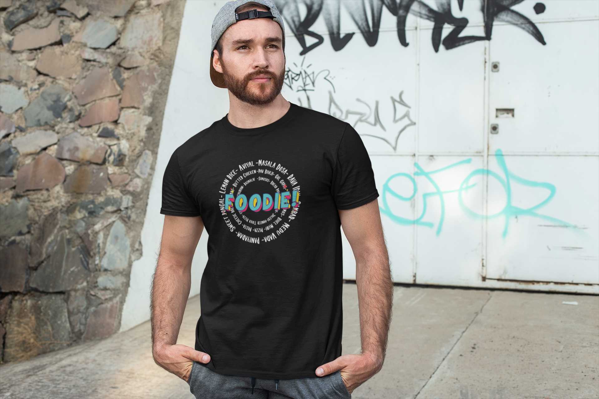 t-shirt-mockup-of-a-man-posing-in-front-of-a-graffgiti-wall-28200