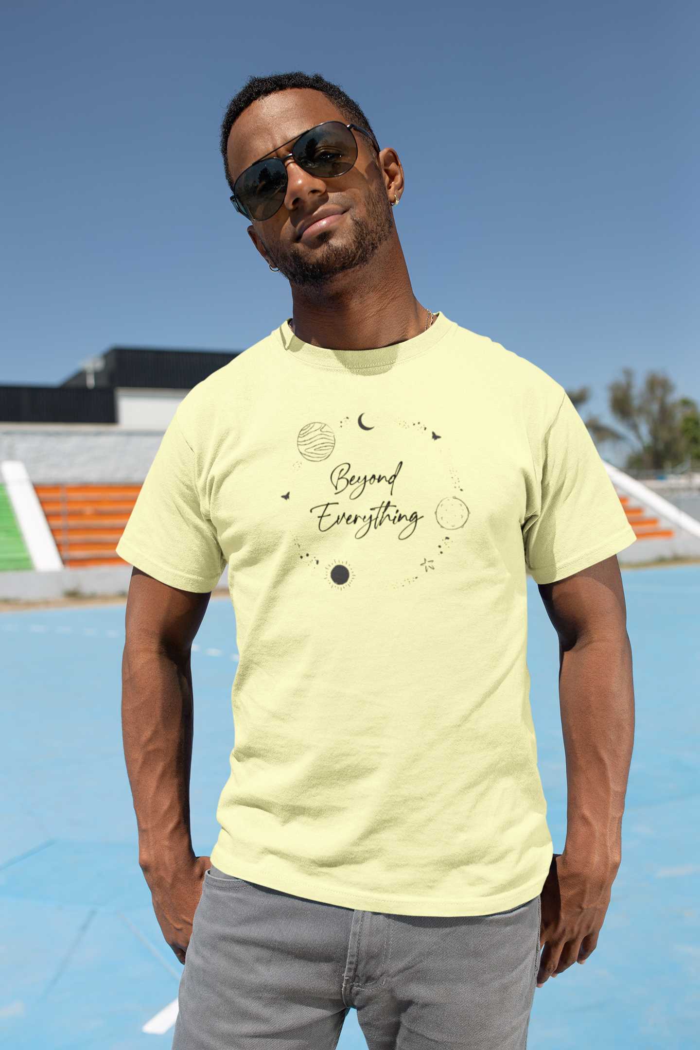 t-shirt-mockup-of-a-muscled-man-wearing-sunglasses-in-a-sports-field-25933 (3)