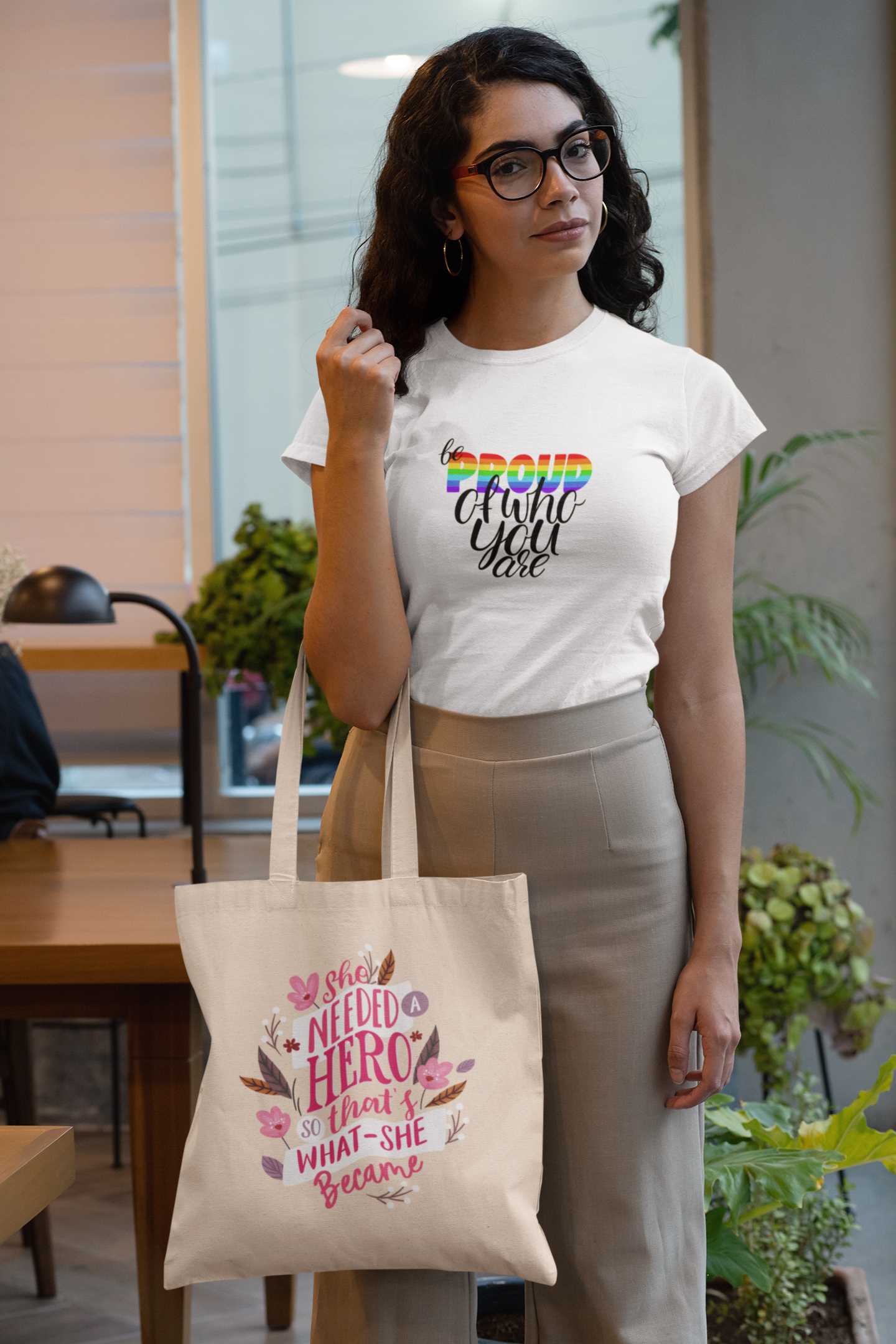 t-shirt-mockup-of-a-woman-holding-a-tote-bag-at-an-office-29413