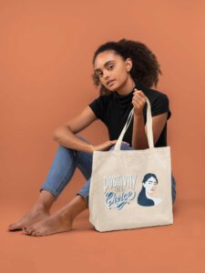 tote-bag-mockup-of-a-young-woman-sitting-barefoot-28865