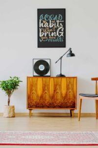 mockup-of-a-framed-poster-and-a-vinyl-record-on-a-modern-studio-36959-r-el2