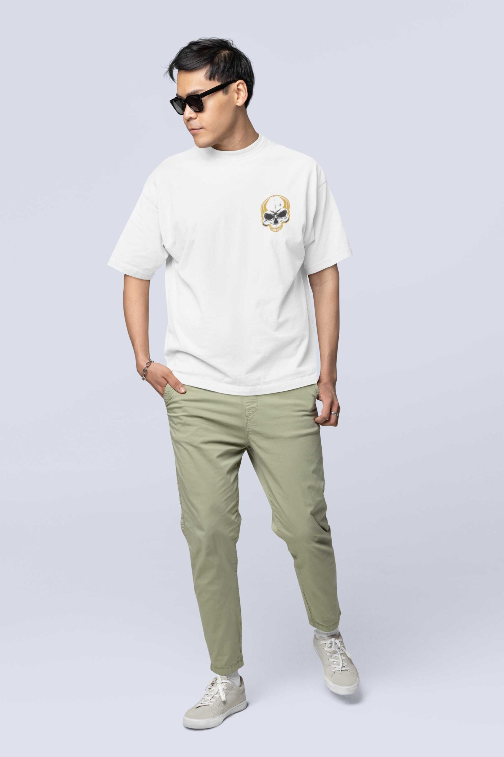 mockup-of-a-man-with-sunglasses-wearing-an-oversized-round-neck-tee-in-a-studio-m38924