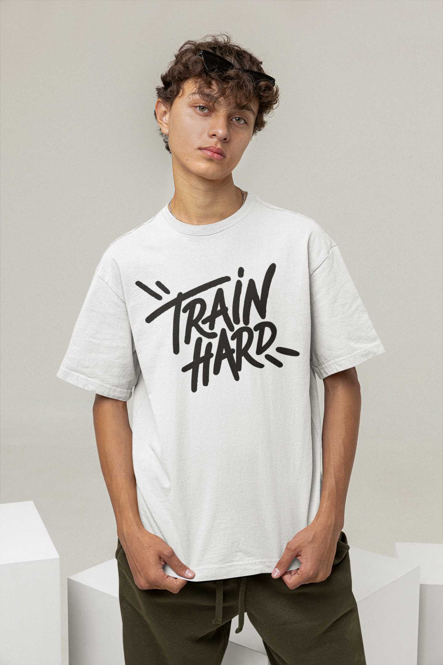 mockup-of-a-young-man-with-curly-hair-showcasing-his-t-shirt-m26210