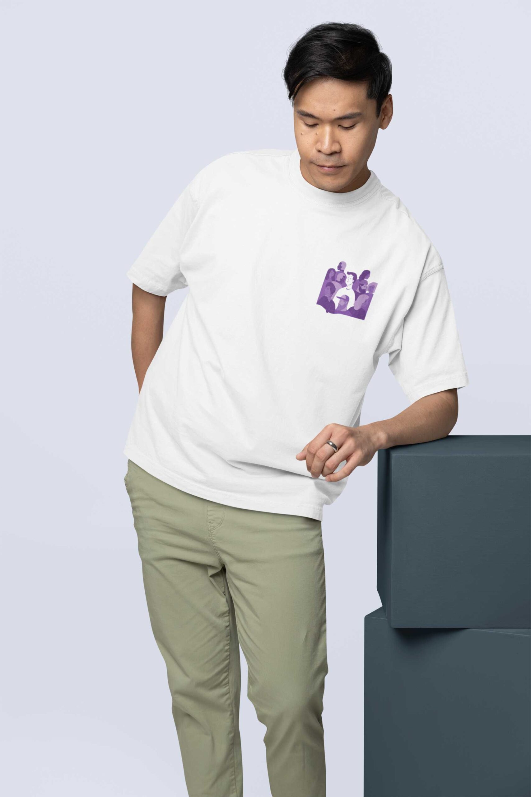 oversized-t-shirt-mockup-featuring-a-man-leaning-on-a-colorful-cube-m38921 (2)