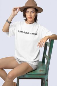 stanley-stella-t-shirt-mockup-featuring-a-woman-with-a-boho-styled-look-sitting-on-an-old-chair-m36870